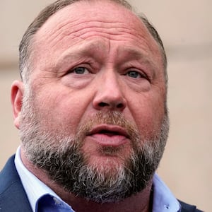 Alex Jones speaks to reporters at the court house as he faces a second defamation trial over Sandy Hook claims in Waterbury, Connecticut, U.S., September 22, 2022.   REUTERS/Michelle McLoughlin