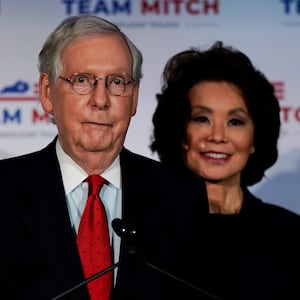 Senate Majority Leader Mitch McConnell (R-KY), accompanied by U.S. Secretary of Transportation Elaine Chao, holds a post election news conference as he declares victory, in Louisville, Kentucky, U.S., November 3, 2020. REUTERS/Bryan Woolston     TPX IMAGES OF THE DAY
