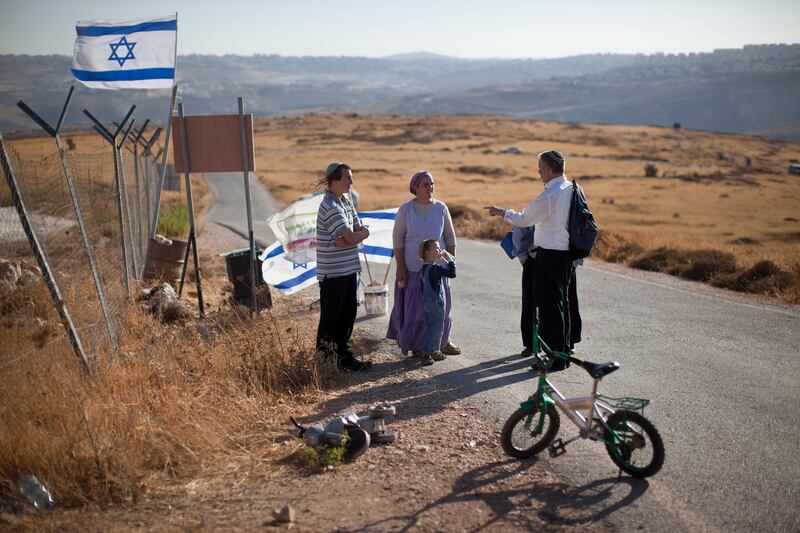 articles/2013/05/29/israeli-peace-camp-empower-moderate-settlers/130317-Lake-Israel-construction-embed_yq9o8j