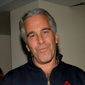 Jeffrey Epstein, pictured in 2005, had images of prominent people on display in his New York home as well as a camera visible in his bedroom, a new report details.
