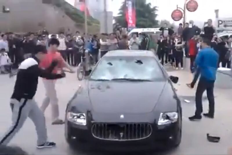 articles/2013/05/16/maserati-smashing-in-china-a-trend-or-publicity-stunt/130513-maserati-smash-tease_cw6nuo