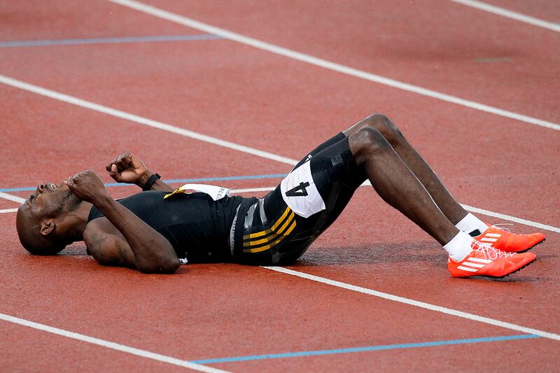 galleries/2012/08/08/doping-racist-tweets-and-throwing-games-olympics-hall-of-shame-photos/kim-collins-olympic-hall-shame_mwccq0