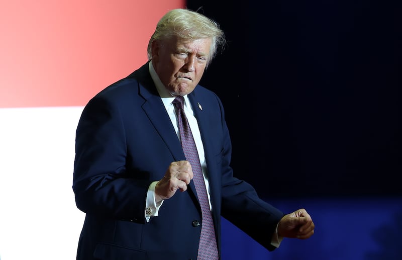 President Donald Trump, pictured Dec. 19 in North Carolina, has long raged against windmills and green energy projects. His administration halted five offshore wind leases on Monday.