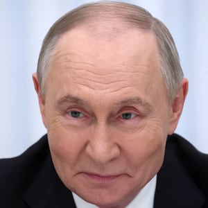 Trump gave sanctions relief to individuals tied to Putin's regime. Getty.