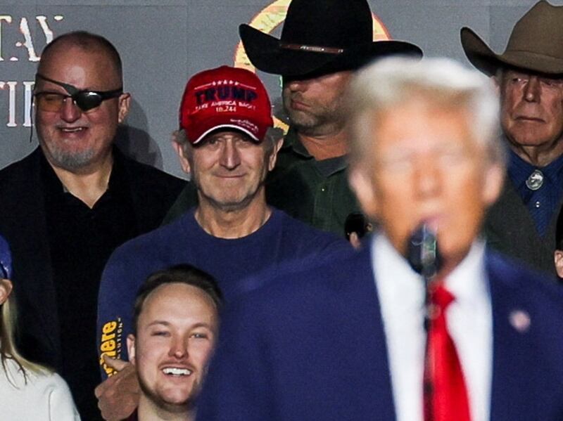 Stewart Rhodes, founder of the far-right Oath Keepers militia, listens to U.S. President Donald Trump, as he speaks at an event about the economy, at the Circa Resort and Casino in Las Vegas, Nevada, U.S., January 25, 2025. REUTERS/Leah Millis