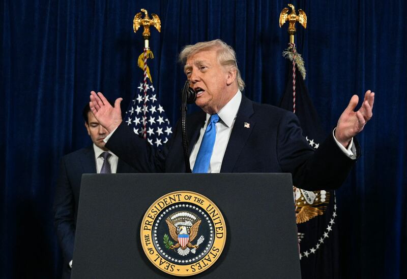 US Secretary of State Marco Rubio looks on as US President Donald Trump speaks to the press following US military actions in Venezuela, at his Mar-a-Lago residence in Palm Beach, Florida, on January 3, 2026.