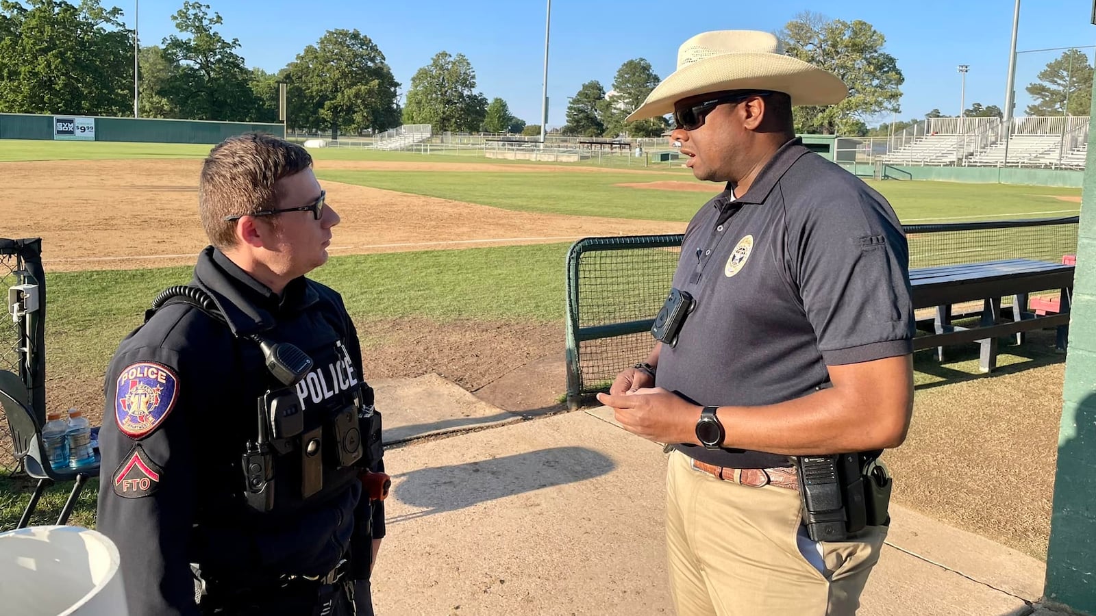 Officers at the scene of a shooting at a college baseball game