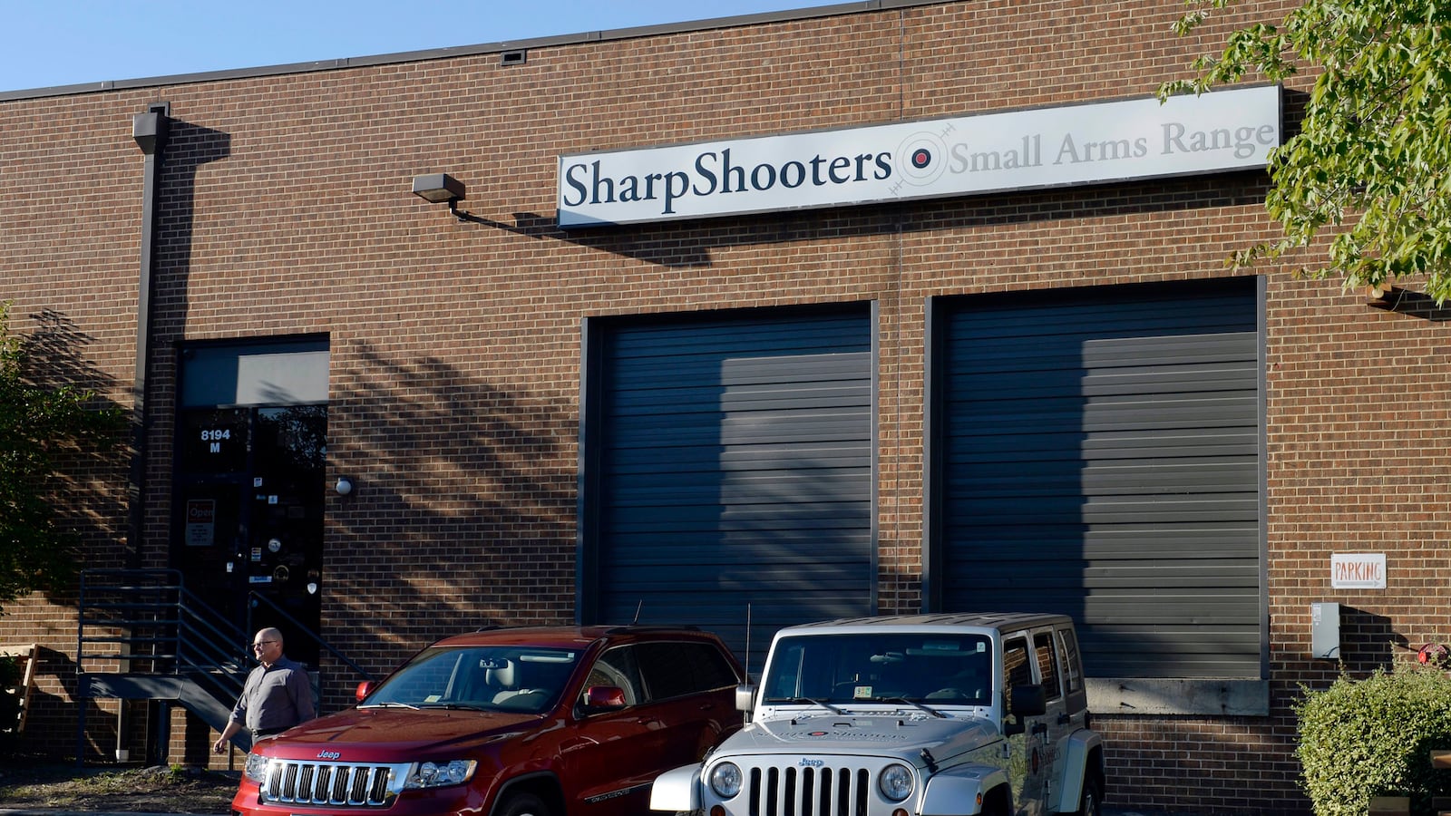 articles/2013/09/18/a-visit-to-sharpshooters-where-aaron-alexis-bought-his-shotgun/130917-sharp-shooters-green-tease_z25fpr
