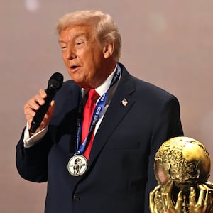 U.S. President Donald Trump speaks as he receives the FIFA Peace Prize.