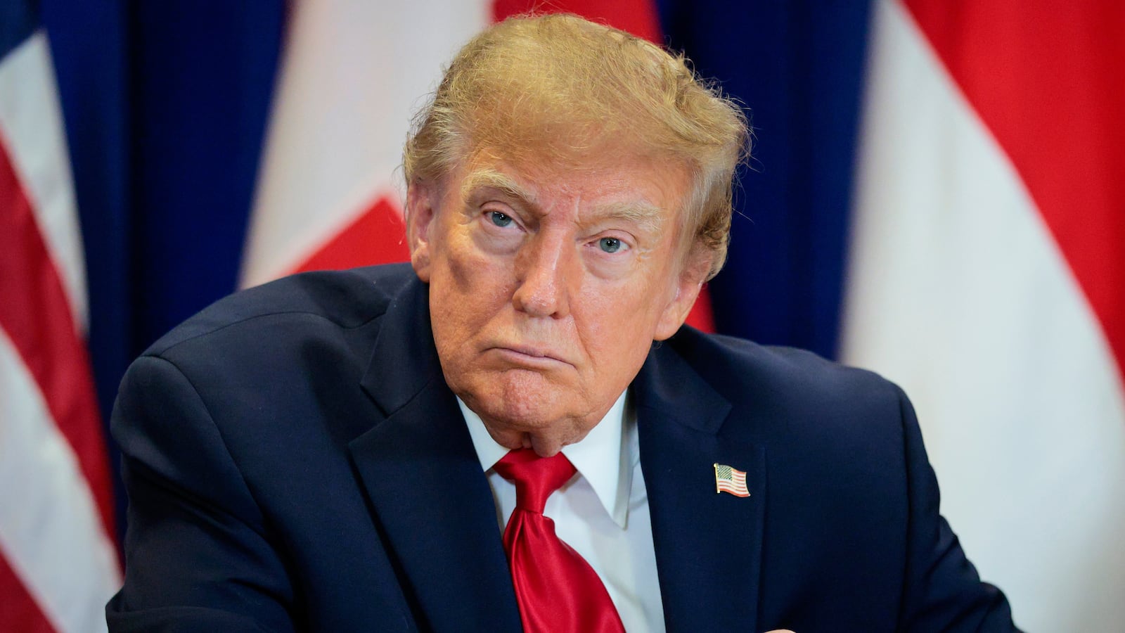 NEW YORK, NEW YORK - SEPTEMBER 22: U.S. President Donald Trump looks on during the signing of a security pact between the U.S., Denmark, and Greenland during the 81st session of the United Nations (U.N.) General Assembly at U.N. Headquarters on September 22, 2026 in New York City. World leaders have gathered in New York for the annual session of the United Nations General Assembly, with this year's global issues ranging from the threat of artificial intelligence to the continued wars in Ukraine and Gaza. (Photo by Chip Somodevilla/Getty Images)