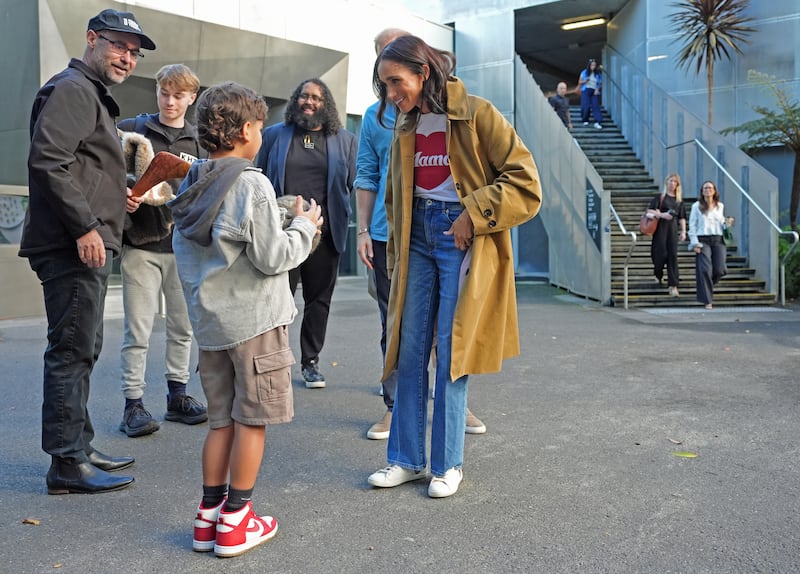MELBOURNE, AUSTRALIA - APRIL 16: Anthony Appo, 9, shows an indigenous Marngrook ball to the Duke and Duchess of Sussex, Prince Harry and Meghan Markle as they meet representatives from the Koorie Heritage Trust before taking part in the Scar Tree Walk on day three of the royal trip on April 16, 2026 in Melbourne, Australia. The Scar Tree Walk is a journey connecting traditional and contemporary Aboriginal cultures and histories of the Kulin Nation. The Duke and Duchess of Sussex are on a four-day visit to Australia, with engagements across Melbourne, Canberra and Sydney. (Photo by Jonathan Brady/PA Wire-Pool/Getty Images)MELBOURNE, AUSTRALIA - APRIL 16: Anthony Appo, 9, shows an indigenous Marngrook ball to the Duke and Duchess of Sussex, Prince Harry and Meghan Markle as they meet representatives from the Koorie Heritage Trust before taking part in the Scar Tree Walk on day three of the royal trip on April 16, 2026 in Melbourne, Australia. The Scar Tree Walk is a journey connecting traditional and contemporary Aboriginal cultures and histories of the Kulin Nation. The Duke and Duchess of Sussex are on a four-day visit to Australia, with engagements across Melbourne, Canberra and Sydney. (Photo by Jonathan Brady/PA Wire-Pool/Getty Images)