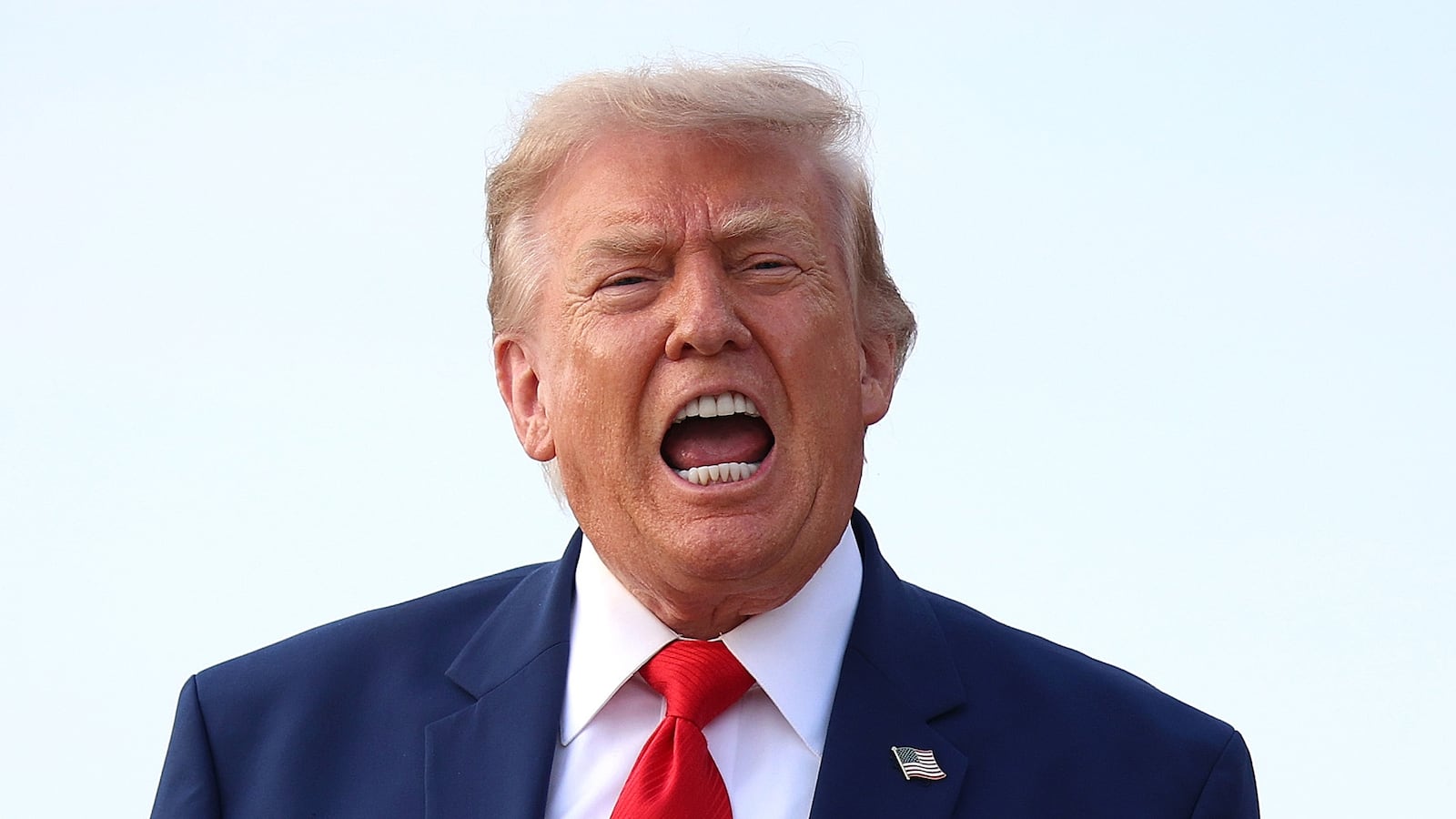 JOINT BASE ANDREWS, MARYLAND - JULY 22: U.S. President Donald Trump calls out to reporters after getting off Air Force One on July 22, 2026 at Joint Base Andrews, Maryland. Trump is returning from attending a dignified transfer at Dover Air Force Base and a rally in Georgia. (Photo by Kevin Dietsch/Getty Images)