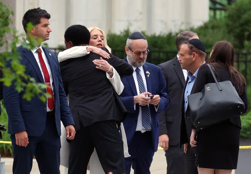 U.S. Attorney General Pam Bondi visits the site of the recent shooting outside Lillian and Albert Small Capital Jewish Museum on May 22, 2025 in Washington, DC. Two Israeli Embassy staff members, Yaron Lischinsky and Sarah Lynn Milgrim, were gunned down Wednesday evening after an event at the museum by a man shouting slogans in support for Palestine.
