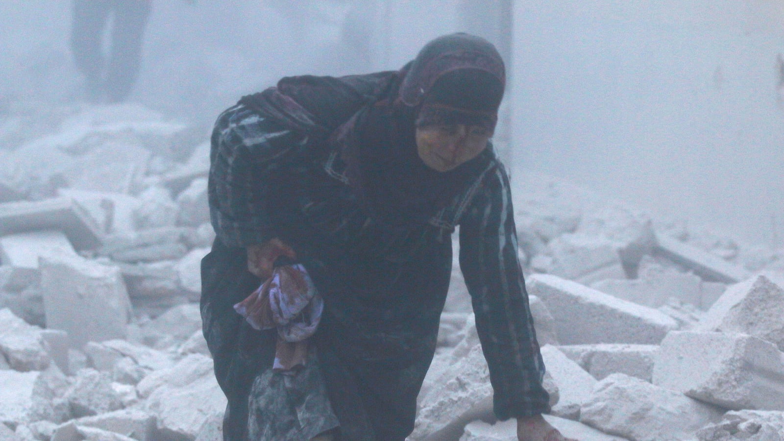 articles/2016/12/12/last-rebels-in-aleppo-say-assad-forces-are-burning-people-alive/161212-weiss-aleppo-suicide-tease2_viaxzx