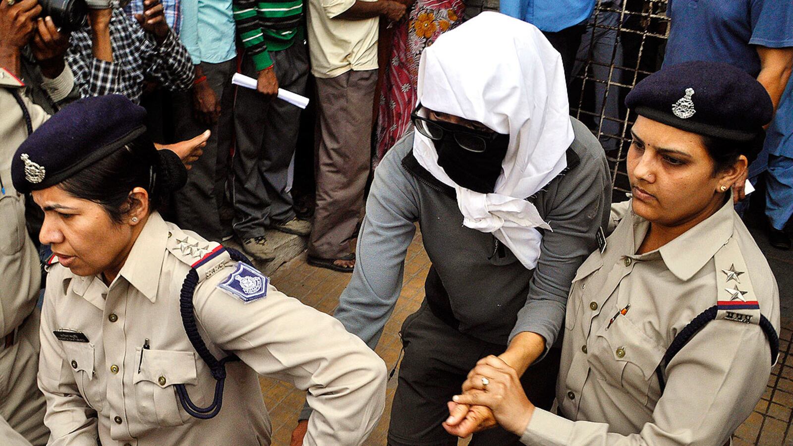 cheats/2013/03/17/indian-cops-nab-5-in-tourist-rape/130317-Gwalior-swiss-rape-cheat_tybhxr
