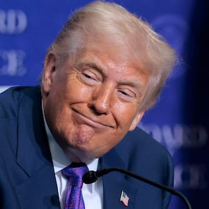 U.S. President Donald Trump looks on during speeches at the inaugural meeting of the Board of Peace at the Donald J. Trump Institute of Peace on February 19, 2026 in Washington, DC.