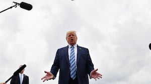 US President Donald Trump speaks to the press at Morristown Municipal Airport in Morristown, New Jersey, on August 13, 2019 as he departs for Pennsylvania where he will visit the Shell Pennsylvania Petrochemicals Complex. (Photo by Nicholas Kamm / AFP) (Photo credit should read NICHOLAS KAMM/AFP via Getty Images)
