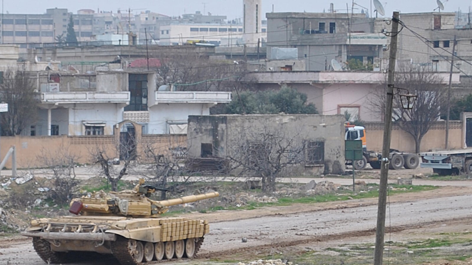cheats/2012/05/14/rebels-syrian-army-shells-in-rastan/syria-shelling-file-cheat_zp4uen