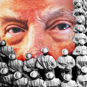 Donald Trump peeking out from a sea of Navy sailors