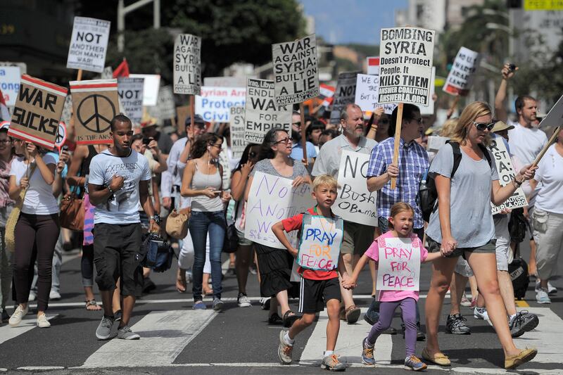 galleries/2013/09/02/president-obama-s-syria-decision-making-photos/130901-syria-protest-cali_ufr2og