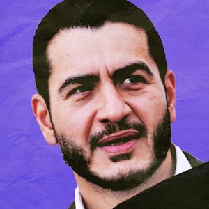 Abdul El-Sayed looking at Donald and Melania Trump