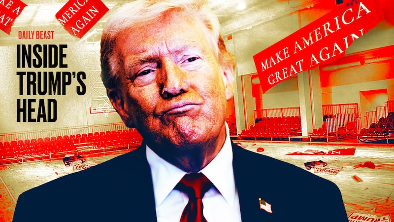 Donald Trump in an empty rally space.