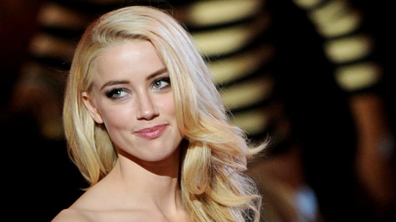 articles/2011/10/29/amber-heard-talks-rum-diary-johnny-depp-playboy-club-and-coming-out-gay/amber-heard-actress-cheat_k1txvc