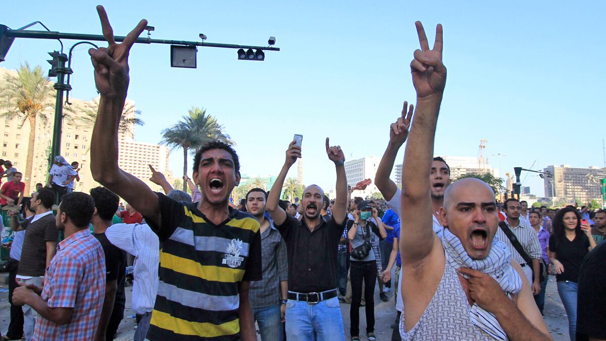 cheats/2011/06/30/1-000-injured-in-egypt-clash/egypt-conflict-vigil-cheat_wemv0o