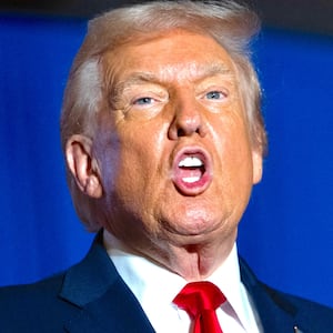 US President Donald Trump sings upon his arrival to deliver remarks on the economy at Mount Airy Casino Resort in Mount Pocono, Pennsylvania, on December 9, 2025.