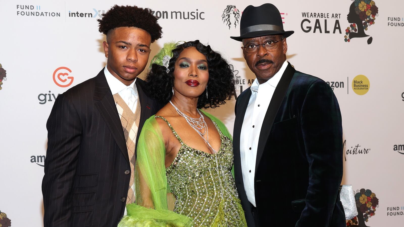 Slater Vance, Angela Bassett and Courtney B. Vance attend the 5th Annual WACO Wearable Art Gala at Barker Hangar on October 22, 2022 in Santa Monica, California.