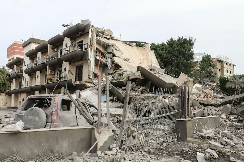 A photograph shows damage at the site of an Israeli airstrike in the southern Lebanese village of Abbasiyeh, on the outskirts of Tyre, on April 15, 2026.