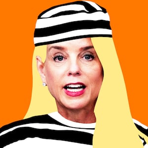 Pam Bondi with an old fashioned prison stripe uniform in front of an orange background