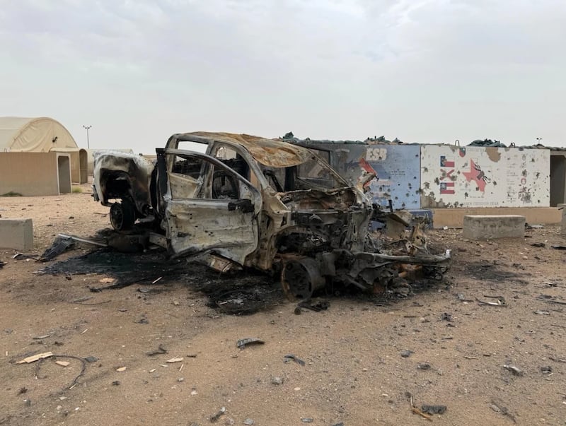 Undated photo of car destroyed during U.S. conflict with Iran, Camp Buehring, Kuwait.