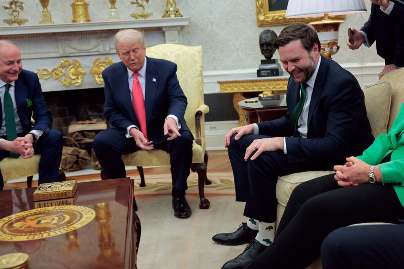 Trump points at Vance's shoes.