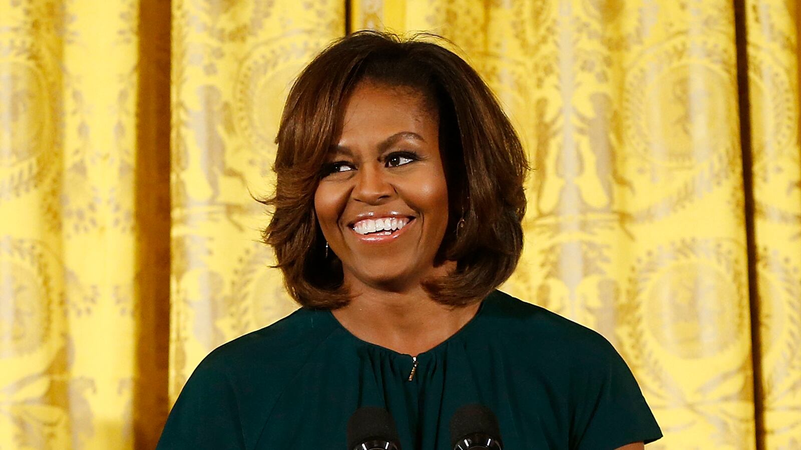 articles/2014/06/09/michelle-obama-talks-beauty-at-maya-angelou-s-memorial-david-beckham-designs-collection-for-belstaff/140609-mobama-beauty-cheat_i1hxgv