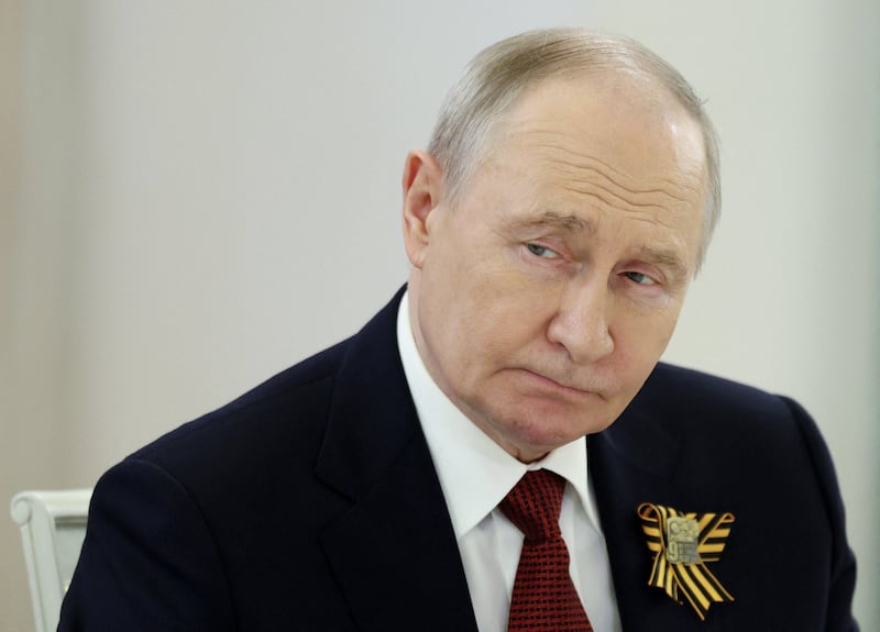 Russian President Vladimir Putin attends a meeting with Laotian President Thongloun Sisoulith at the Kremlin in Moscow, Russia May 9, 2026.