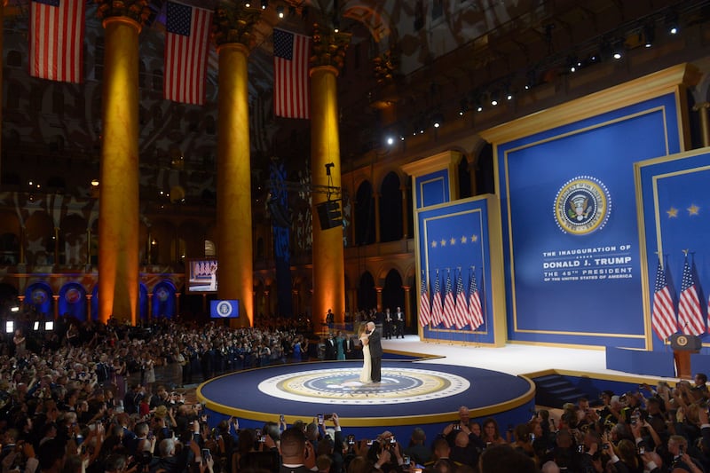 US President Donald Trump and First Lady Melania Trump dance during the Salute to Our Armed Services Inaugural Ball at the National Building Museum in Washington, DC, January 20, 2017.