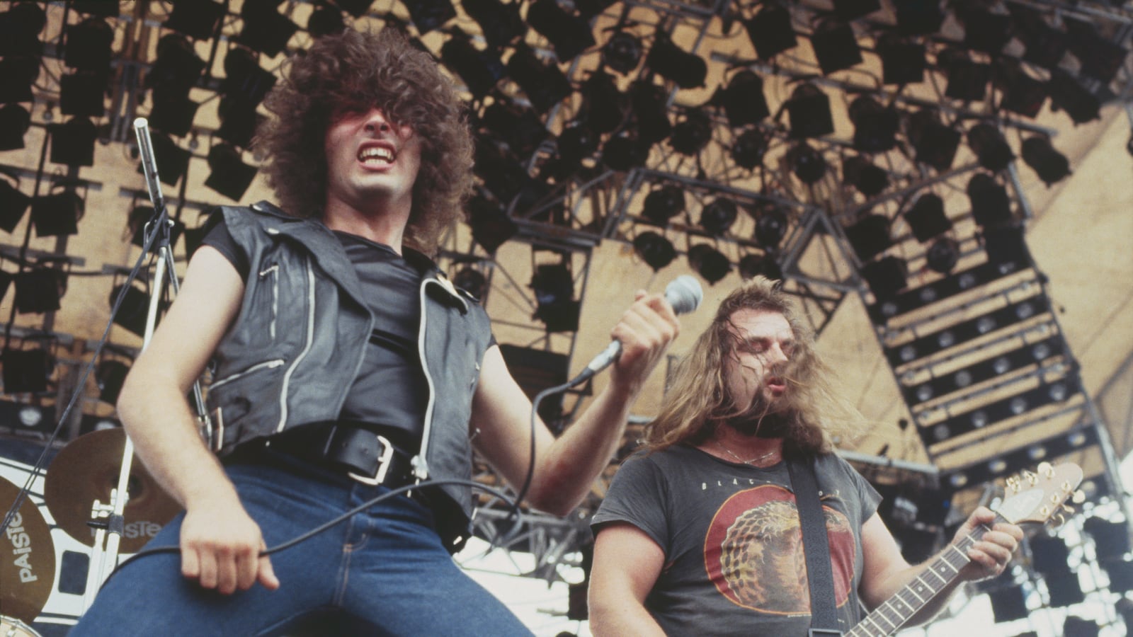 Vocalist Paul Mario Day and guitarist Kenny Cox of heavy metal group More perform live on stage at the Monsters of Rock festival at Donington Park, Leicestershire, 22nd August 1981. (Photo by Michael Putland/Getty Images)