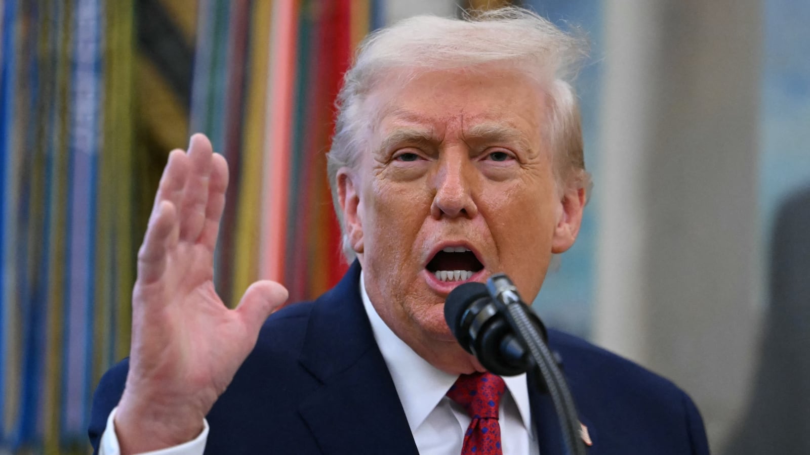 US President Donald Trump speaks during a Mexican Border Defense Medal presentation in the Oval Office of the White House in Washington, DC, on December 15, 2025. (Photo by ANDREW CABALLERO-REYNOLDS / AFP via Getty Images)