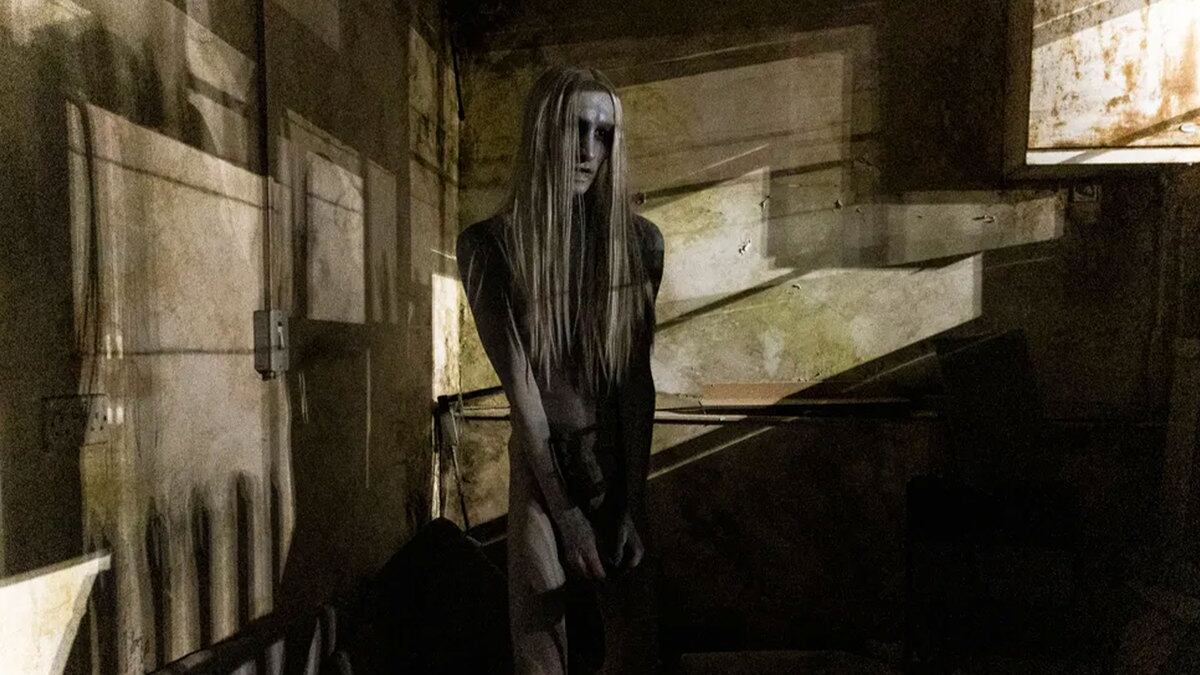 A ghastly figure stands in a corner in ‘All You Need is Death’