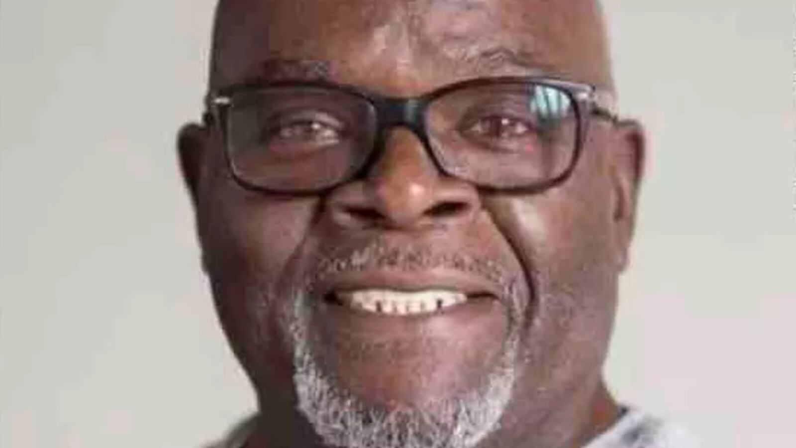 Headshot of Michael Hill smiling