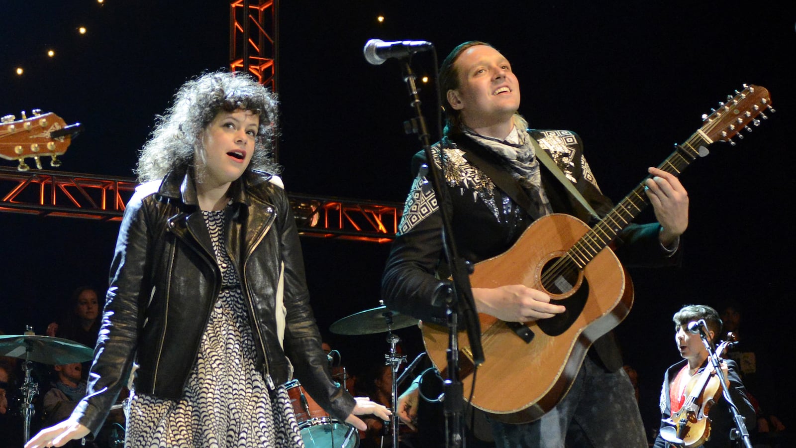 articles/2013/10/29/reflektor-makes-arcade-fire-the-biggest-band-in-the-world/131028-romano-arcade-fire-tease-embed_whj9jr