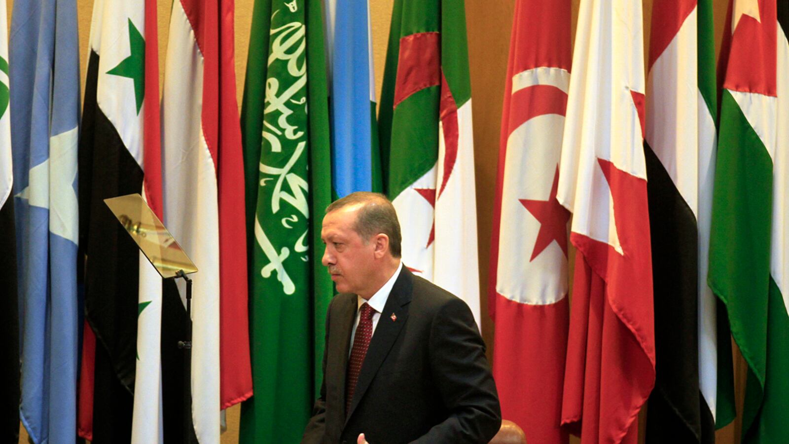 articles/2011/09/13/turkey-s-tricky-drone-diplomacy-with-israel-and-u-s-over-pkk/erdogan-flags-matthews_v4dvyx