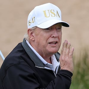 U.S. President Donald Trump tees off after opening of his new golf course at his Trump International Golf links resort on July 29, 2025 in Balmedie, Scotland.