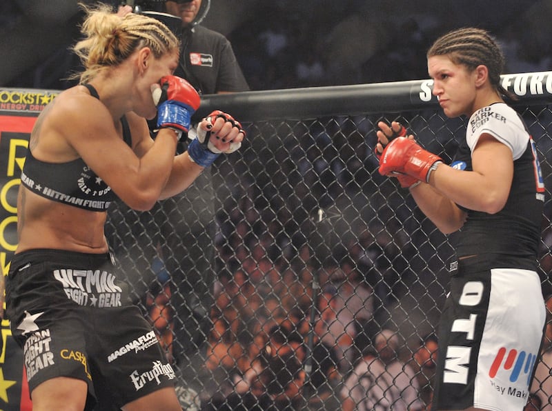 Cris Cyborg battles Gina Carano during their Middleweight Championship fight on August 15, 2009, in San Jose, California.