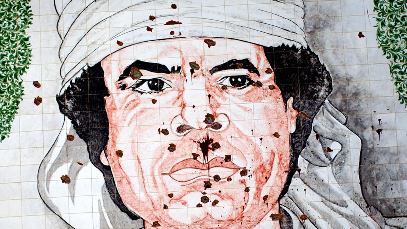 cheats/2011/10/06/gaddafi-calls-for-protests/libya-gaddafi-bullets-cheat_xh11zp
