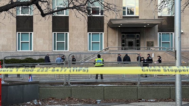 Police outside the U.S. Consulate after shots were fired in Toronto.  REUTERS/Kyaw Soe Oo