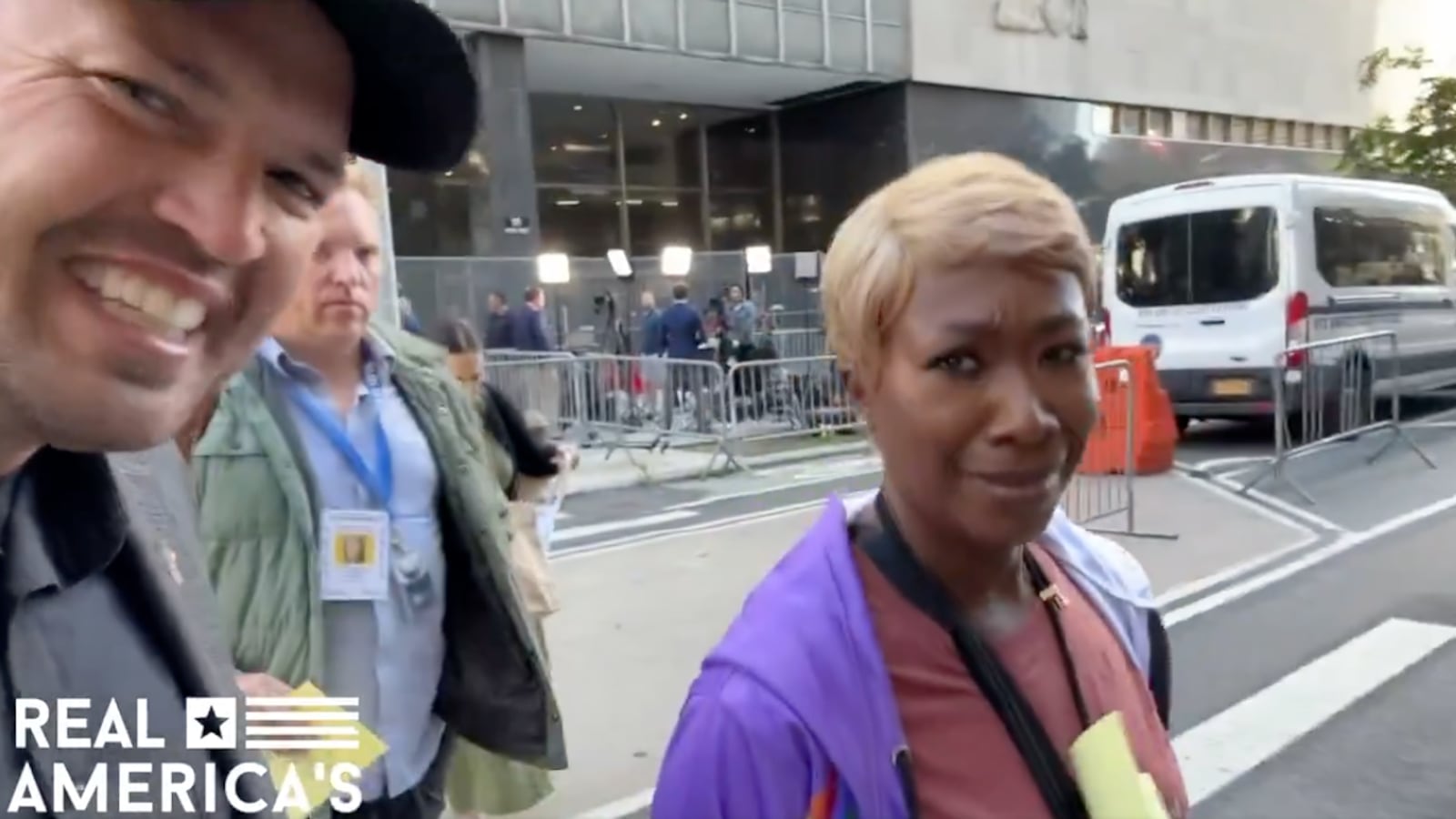 MSNBC host Joy Reid confronts a right-wing troll outside Donald Trump’s New York City trial.