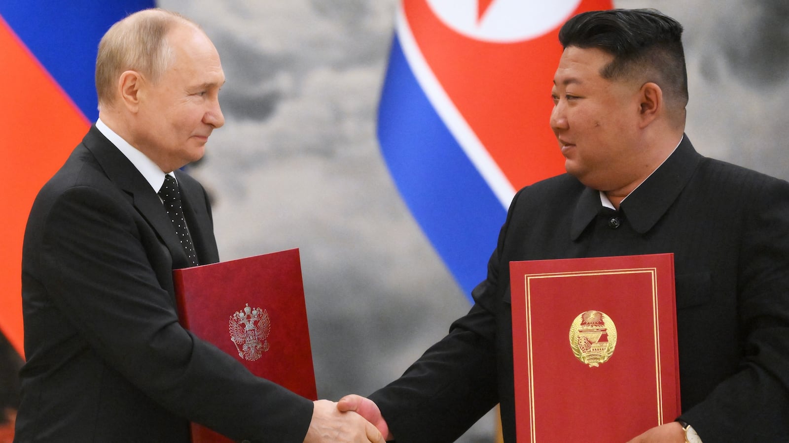 Vladimir Putin and Kim Jong Un in Pyongyang last year