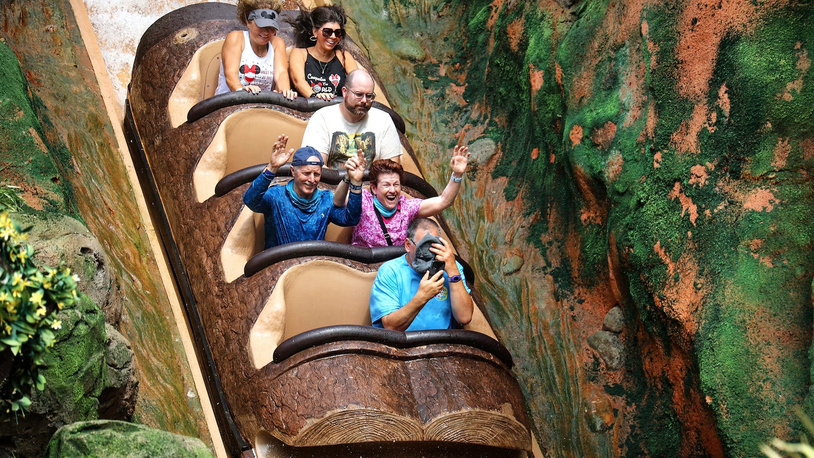 Guests enjoy the big plunge down the front of Tiana's Bayou Adventure at the Magic Kingdom in Walt Disney World, on July 10, 2024, in Lake Buena Vista, Florida.